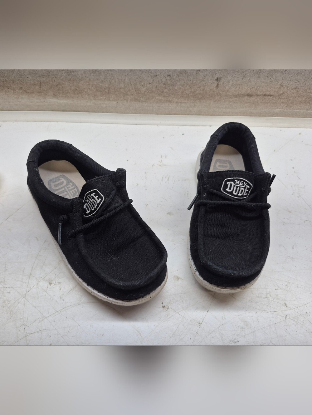 Kids black and white hey dudes size K10